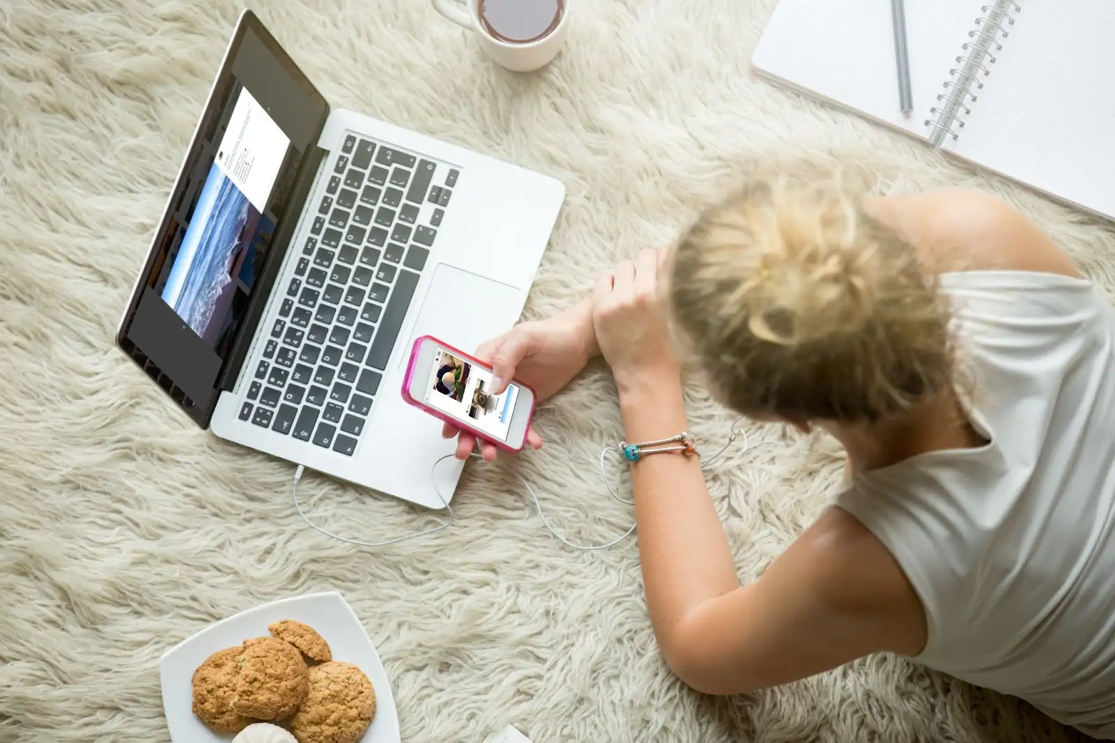 User browsing the internet on both mobile and desktop devices, illustrating why Xfinity Internet plans in Madison are different in providing reliable connectivity across platforms.