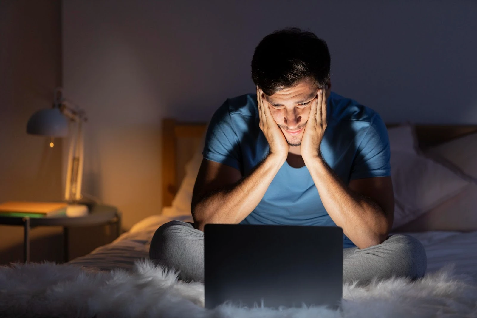 Man using a laptop at home to browse the internet, representing “Comcast Internet Plans in Chicago: Why They’re Different.”