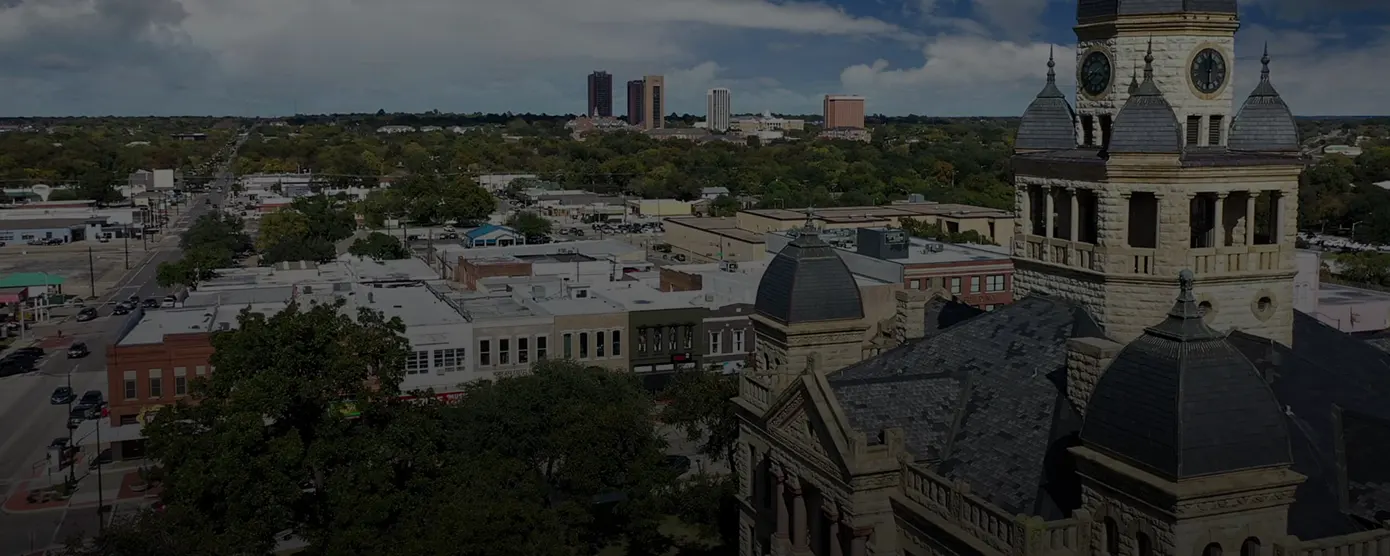 Aerial view of Denton, Texas, highlighting the city landscape and skyline, used as a banner image for internet providers in Denton, TX.