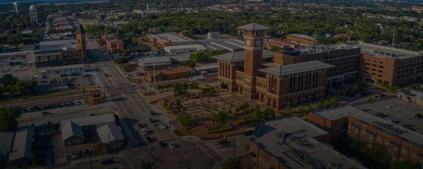 Aerial view of Grapevine, Texas, showcasing the city layout and nearby landscape, used as a banner image for internet providers in Grapevine, TX.