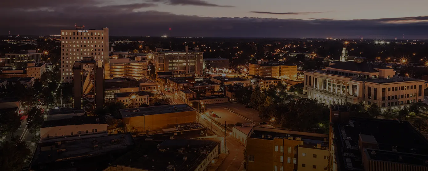 Aerial view of Lafayette, Louisiana, showcasing the city layout and surrounding greenery, used as a banner image for internet providers in Lafayette, LA.