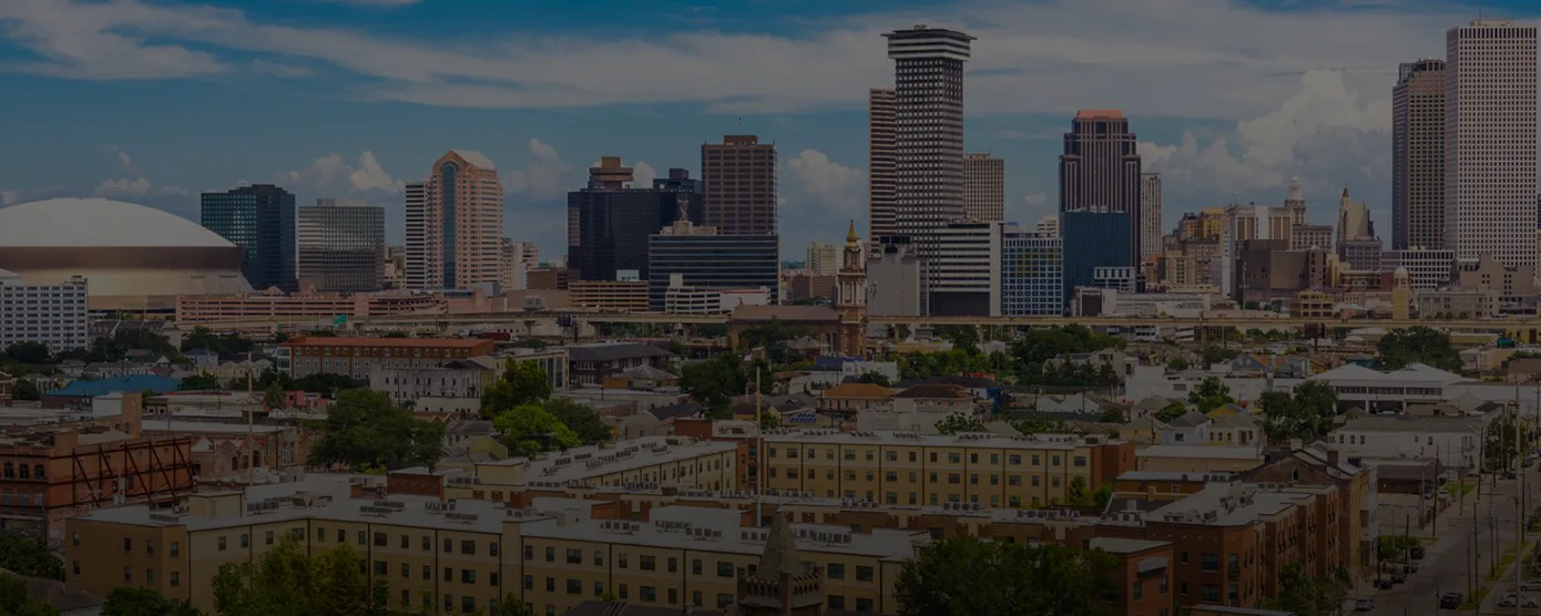 Aerial view of downtown Metairie, Louisiana, showing commercial buildings and surrounding streets, with overlay text that reads “Internet Providers in Metairie, LA — Where Fast Internet Meets Real Southern Hospitality.”