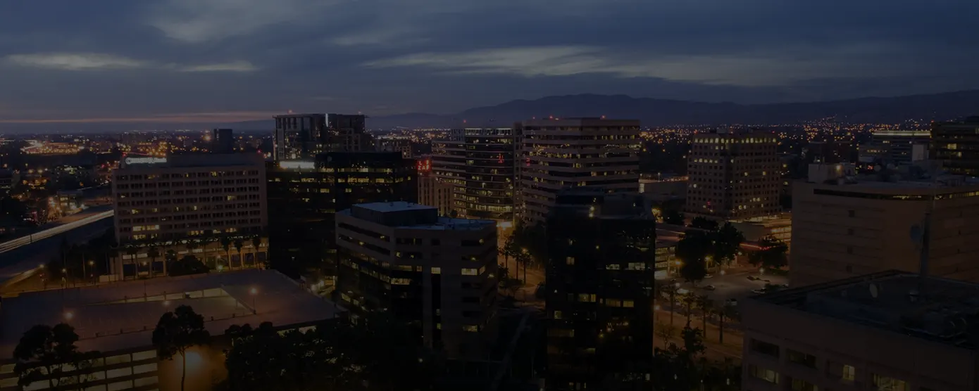 Aerial night view of Santa Clara, California cityscape with illuminated buildings and streets, representing Internet Providers in Santa Clara, CA and available connection options.
