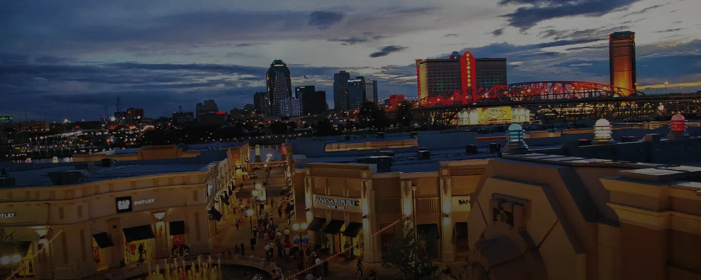 Aerial view of Shreveport, Louisiana, highlighting the city’s skyline, riverfront, and surrounding neighborhoods. Banner overlay text says “Internet Providers in Shreveport, LA, That Deliver More Than Promises.”