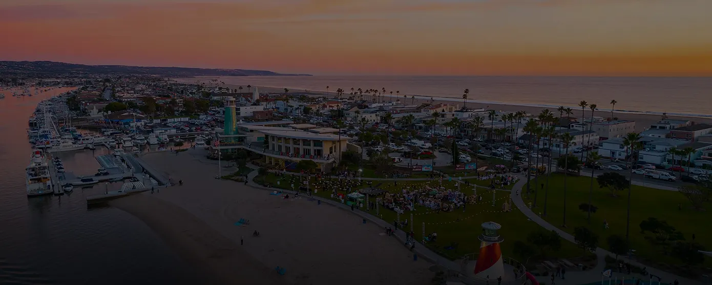 Newport Beach California coastline with ocean waves and sandy beach view representing reliable internet providers in Newport Beach.