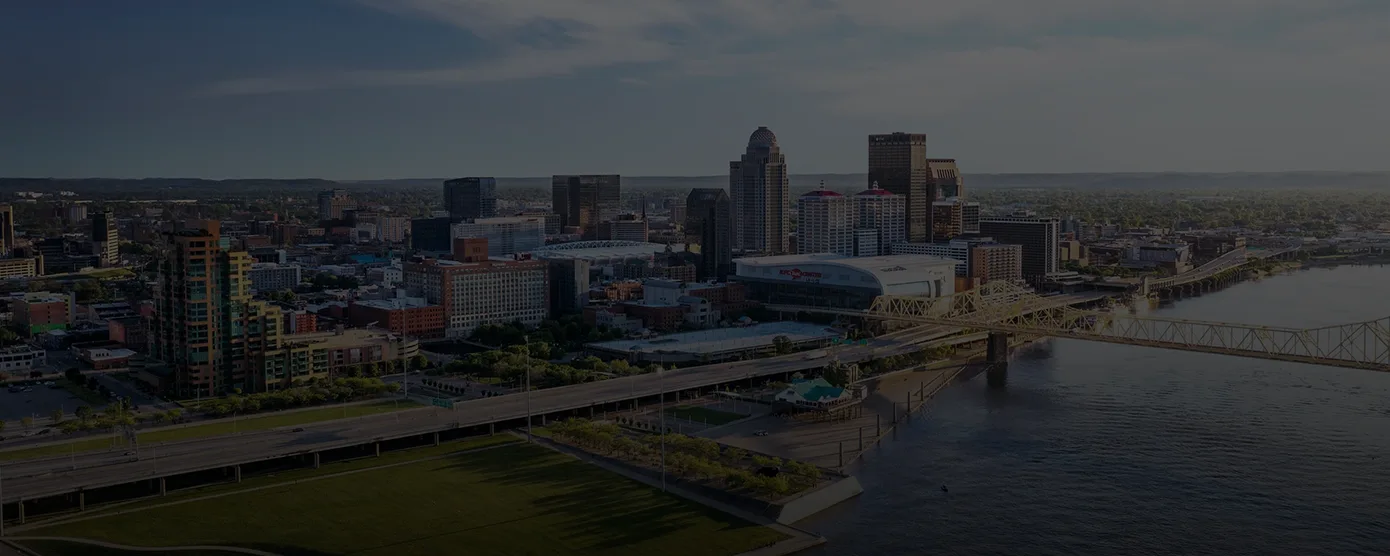 Downtown Louisville, Kentucky skyline with the Ohio River in view, representing internet coverage in the city – banner for 'Best Internet in Louisville, KY – Compare Providers the Easy Way