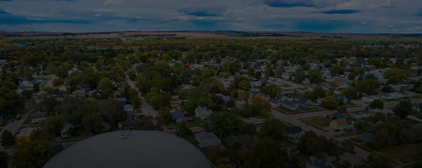 Scenic view of North Platte, Nebraska with residential neighborhoods and open plains, reflecting local internet access – banner for 'Best Internet Providers North Platte, NE – Fast Speeds and Affordable Prices'