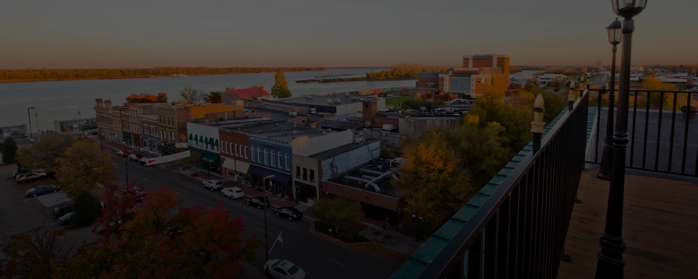 View of Paducah, Kentucky featuring the Ohio River waterfront and city buildings, representing internet provider options – banner for 'Internet Providers in Paducah, KY – Compare Plans Easily'