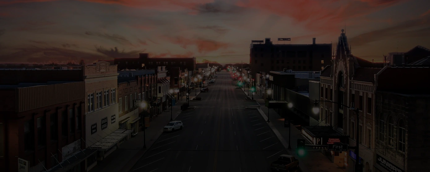 View of Ponca City, Oklahoma with downtown buildings and residential areas, symbolizing local internet services – banner for 'Internet Providers in Ponca City, OK – Compare, Choose & Stay Connected'