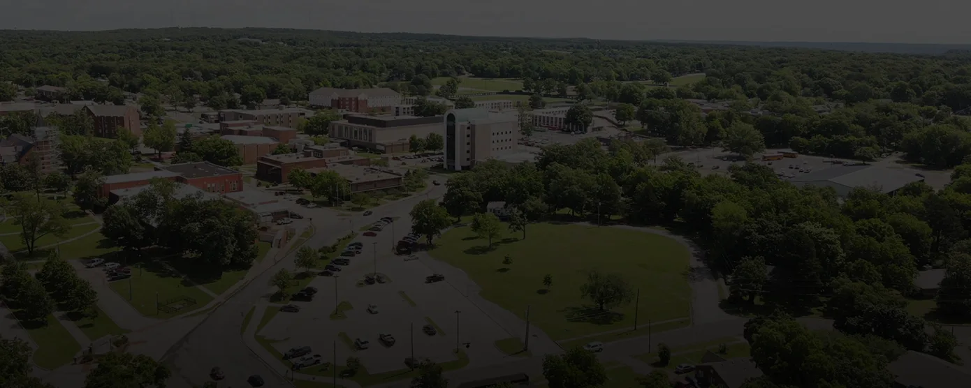 View of Tahlequah, Oklahoma showing residential areas and greenery, representing local internet service options – banner for 'Internet Providers in Tahlequah, OK – Talk Walk Connection’s Guide to Choosing the Best Plan'