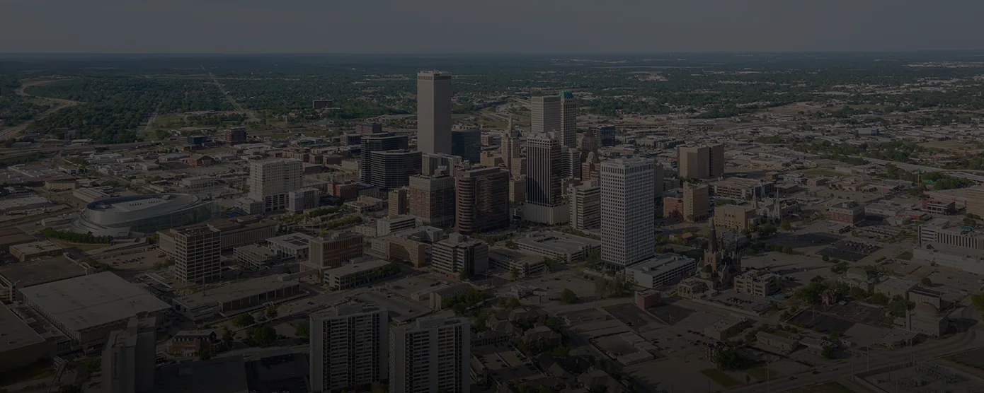 Aerial view of Tulsa, Oklahoma, highlighting the city skyline and neighborhoods, featured in a guide about the Best Internet Provider in Tulsa, OK – Compare Plans with Talk Walk Connection.
