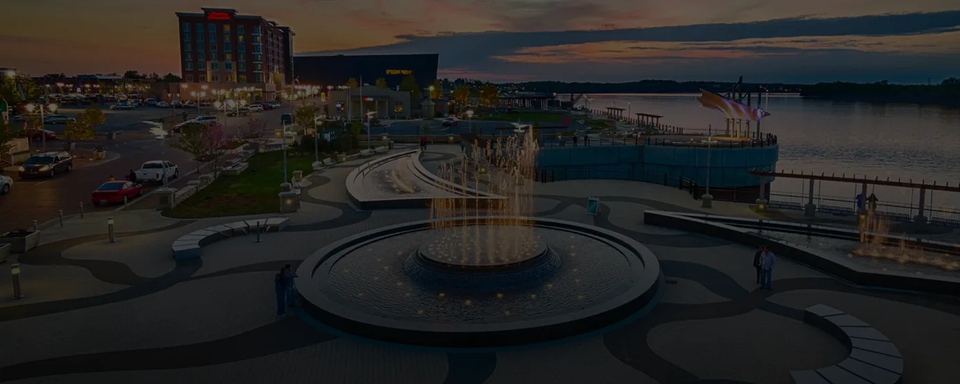 Aerial view of Owensboro, Kentucky, featuring the cityscape along the Ohio River with bridges and downtown buildings — illustrating the theme “Internet Providers Owensboro, KY: Your Local Connection Guide.”